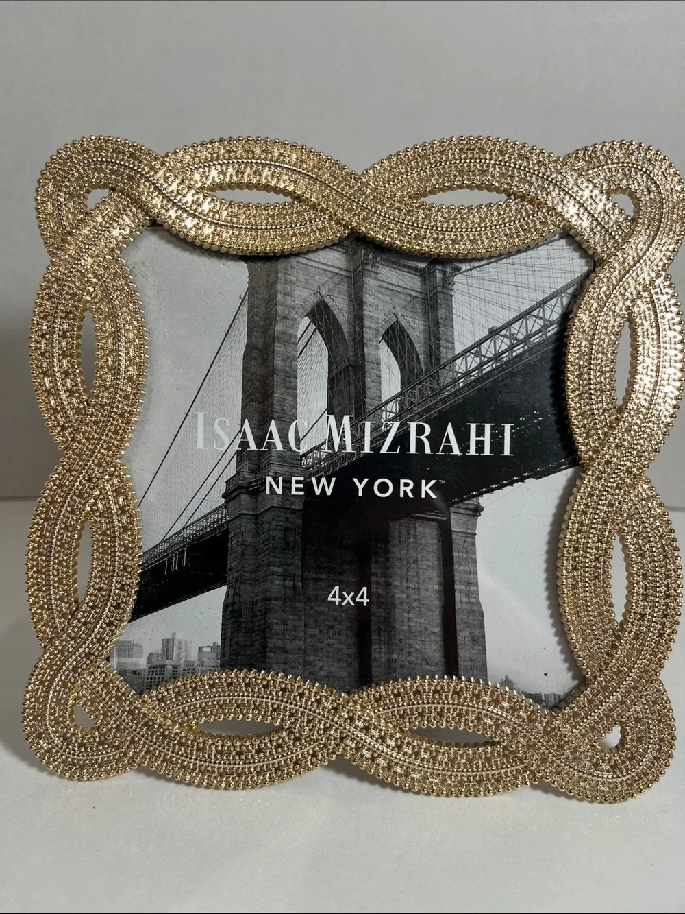 Isaac Mizrahi gold shelf texture